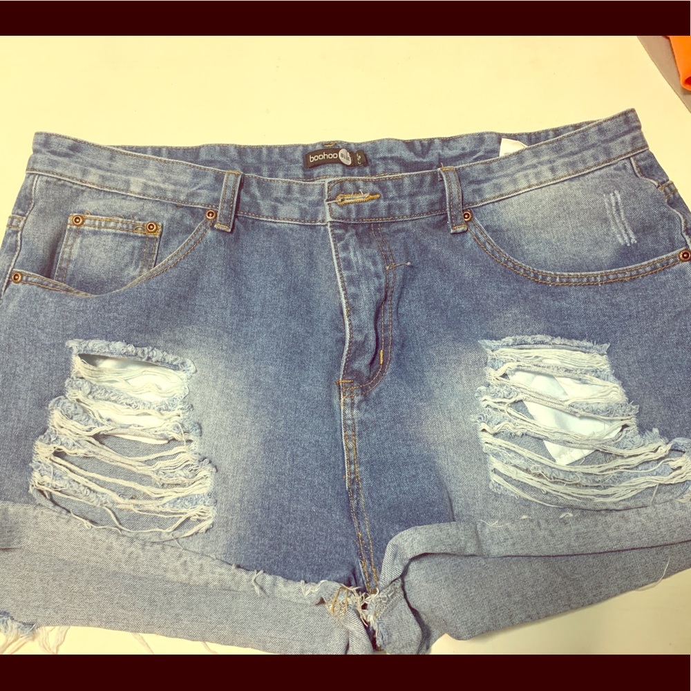 Distressed denim shorts
